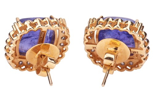 Lot A pair of tanzanite and diamond cluster...