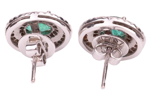 Lot A pair of emerald and diamond cluster earrings,...
