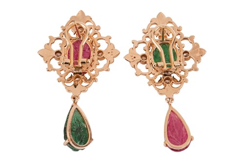 Lot 323 - A pair of drop earrings set with carved...