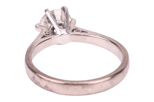 Lot A diamond solitaire ring, claw-set with a...
