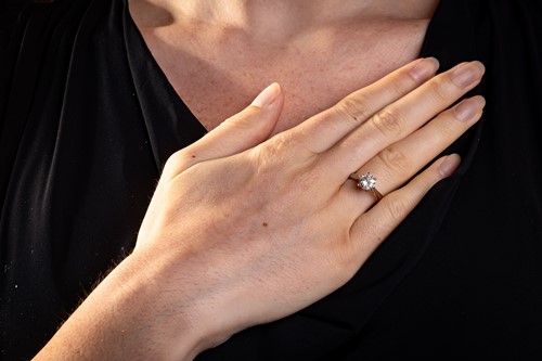 Lot A diamond solitaire ring, claw-set with a...