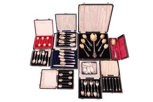 Lot 89 - A cased set of dessert spoons, including a...
