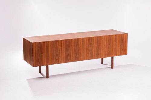 Lot 85 - Benchmark Furniture: a walnut sideboard, drop...