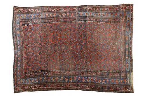 Lot 70 - A large red ground Farahan carpet, with...