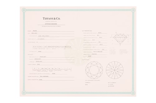 Lot Tiffany & Co. - a diamond ribbon solitaire...