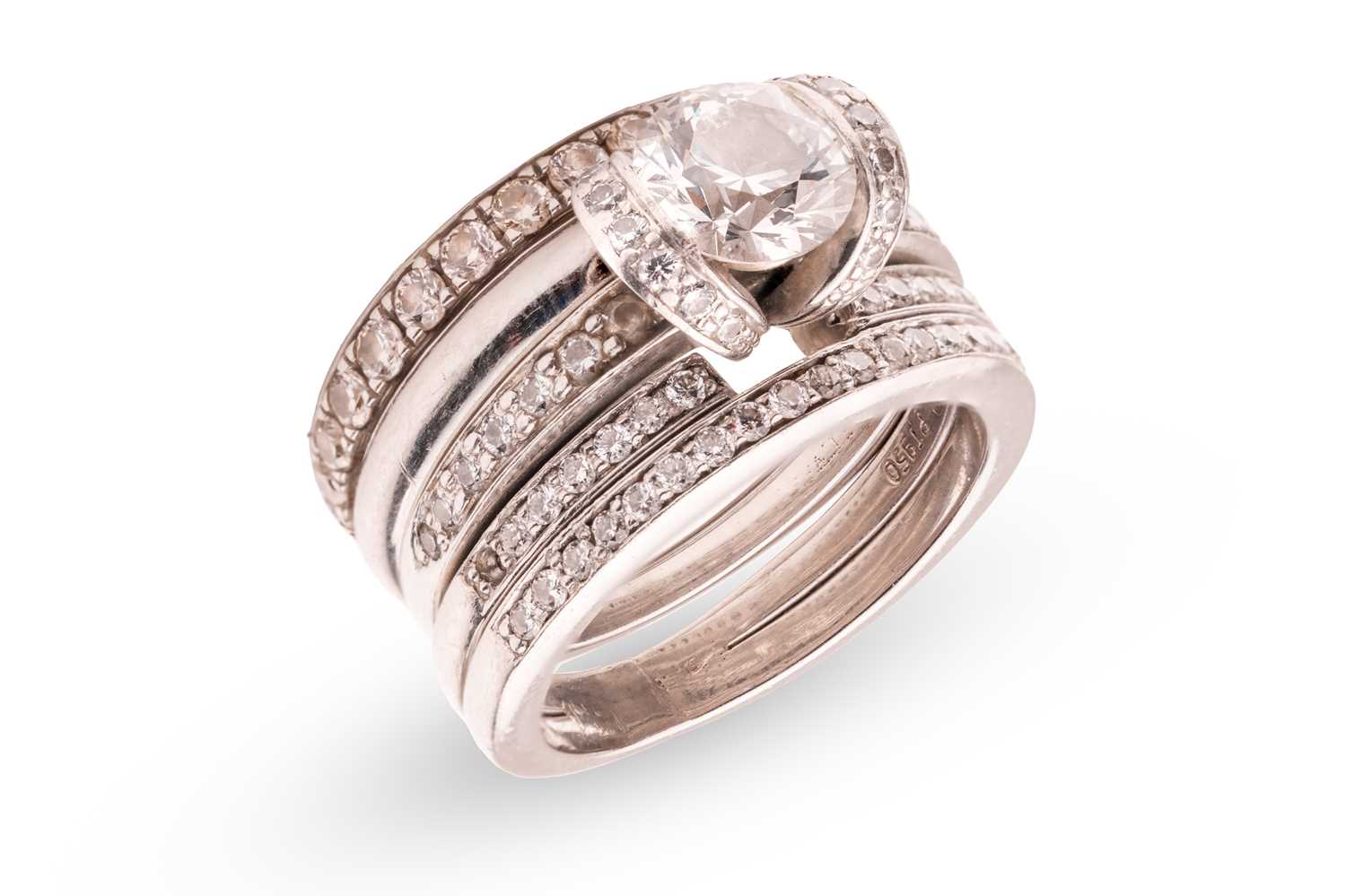 Lot Tiffany & Co. - a diamond ribbon solitaire...