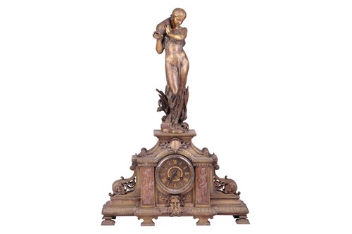 Lot An 8-day gilt brass figural mantel clock, with...