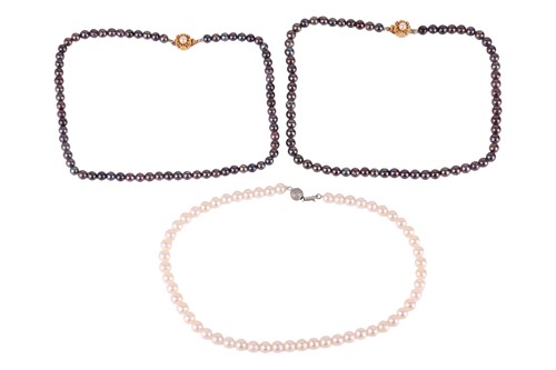 Lot Three strands of cultured pearl necklaces;...