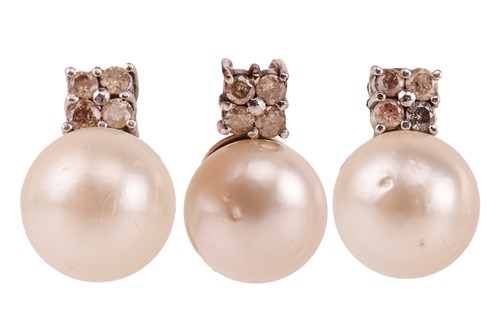 Lot A South Sea cultured pearl and diamond pendant,...