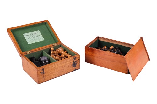 Lot A matched set of Staunton pattern chess pieces,...