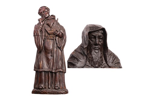 Lot 304 - A carved softwood wall mount depicting St...