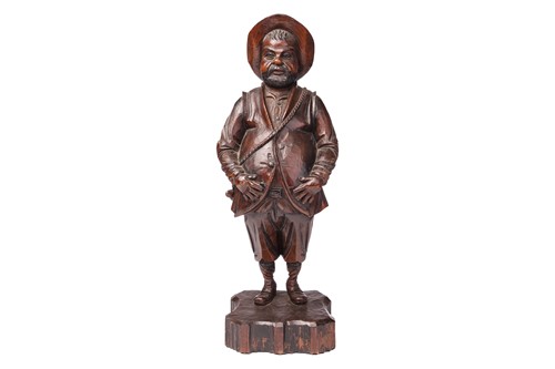 Lot 293 - A stained softwood carved figure of Sancho...