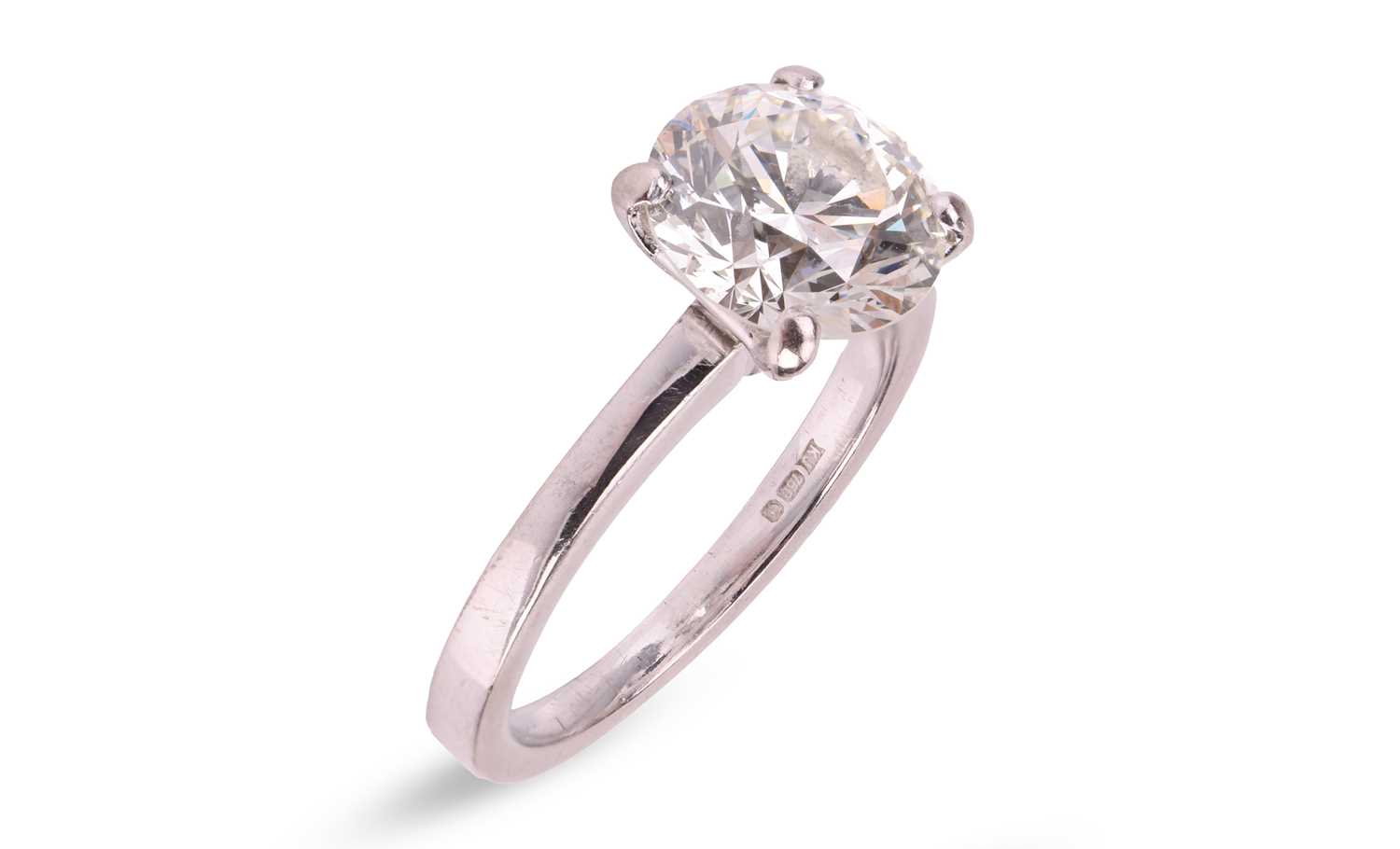 Lot A diamond solitaire ring in 18ct white gold,...