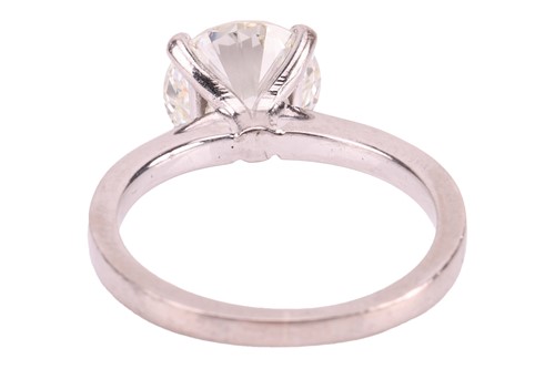 Lot A diamond solitaire ring in 18ct white gold,...