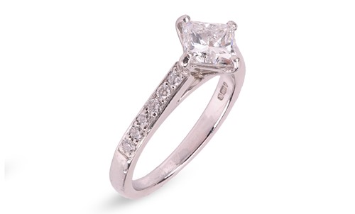 Lot A princess-cut diamond solitaire ring in...