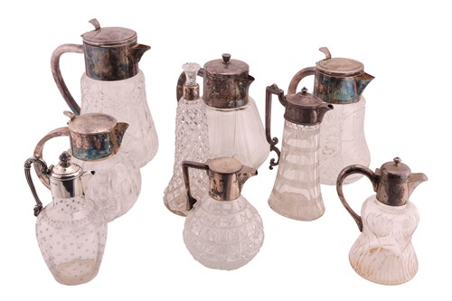 Lot 70 - A silver-mounted cut glass claret jug, of...