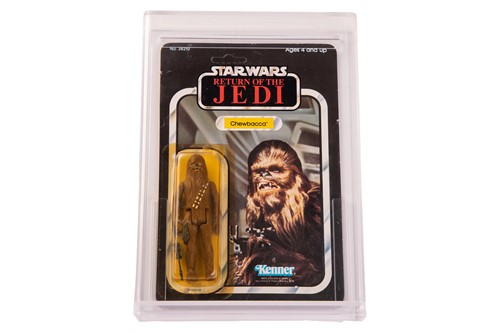 Lot Star Wars: a vintage Kenner Chewbacca carded...