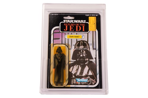Lot Star Wars: a vintage Kenner Darth Vader carded...