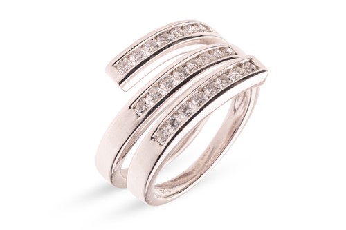 Lot 42 - A diamond-set wrap-around ring, with an...
