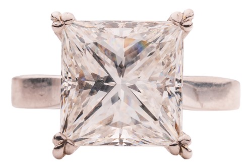 Lot A princess-cut diamond solitaire ring,...