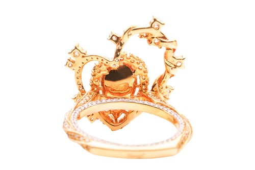 Lot A diamond dress ring, with a total diamond...