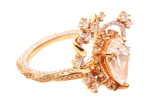 Lot A diamond dress ring, with a total diamond...
