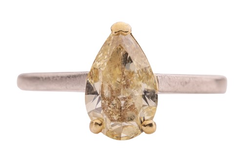 Lot A pear-cut fancy yellow diamond solitaire ring,...