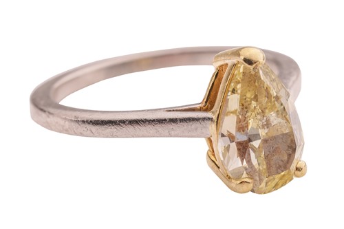 Lot A pear-cut fancy yellow diamond solitaire ring,...