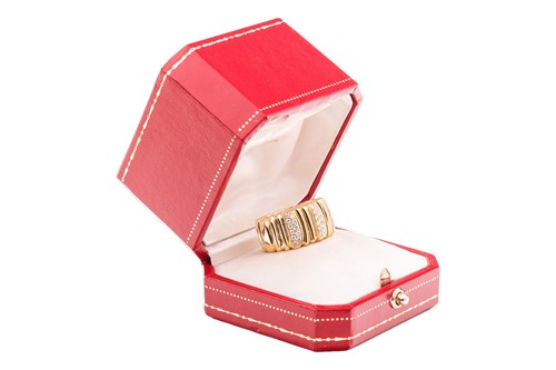 Lot Cartier - a diamond-set "Casque D'or" ring,...