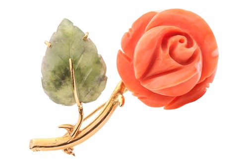 Lot 176 - A rose brooch with carved coral and nephrite,...