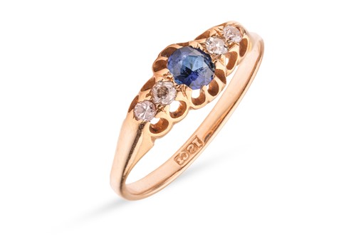 Lot 182 - A sapphire and diamond half-hoop ring, centred...
