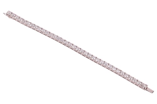 Lot 126 - An impressive diamond-set line bracelet, with...