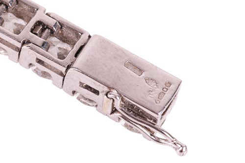 Lot 126 - An impressive diamond-set line bracelet, with...