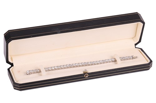Lot 126 - An impressive diamond-set line bracelet, with...
