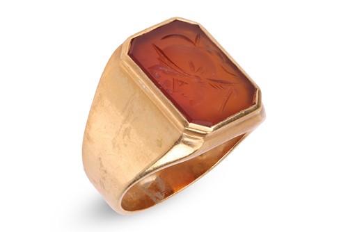Lot 338 - A carnelian intaglio signet ring, the...