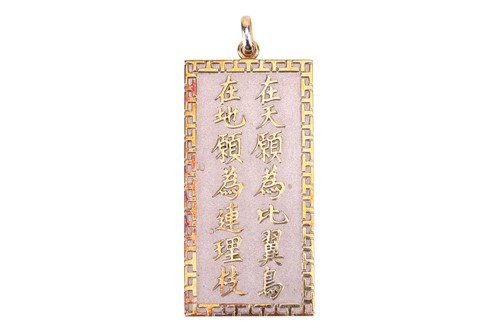 Lot 304 - A Chinese pendant, the two-tone rectangular...