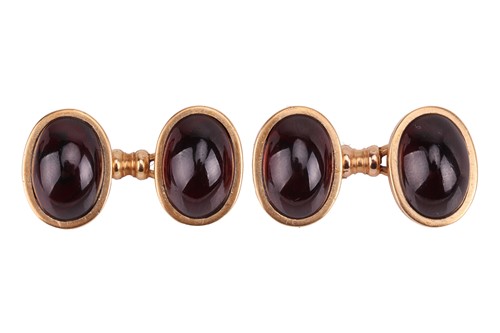 Lot 54 - A pair of late 19th-century garnet cabochon...