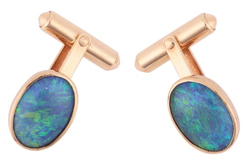Lot 312 - Boodle & Dunthorne - a pair of opal cabochon...