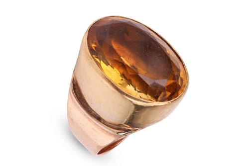Lot 180 - A large citrine cocktail ring, comprising an...