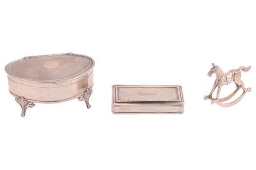 Lot 352 - A silver jewellery box, kidney-shaped with...