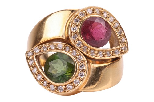 Lot 244 - A tourmaline and diamond crossover ring,...