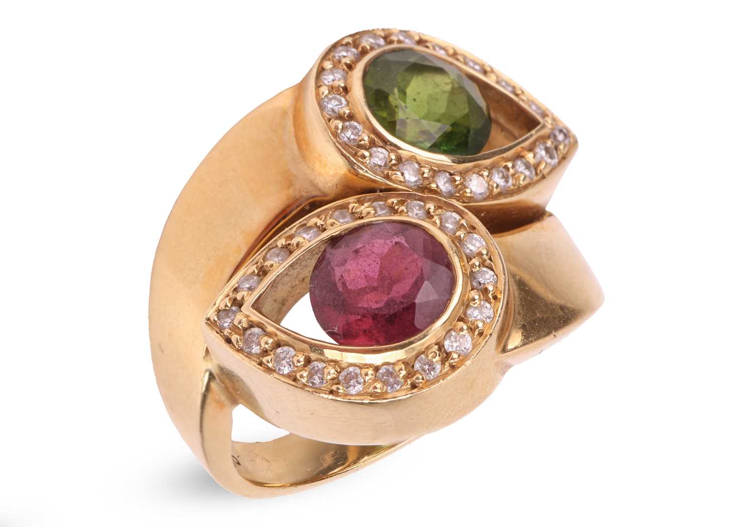 Lot 244 - A tourmaline and diamond crossover ring,...