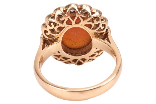 Lot A fire opal and diamond cluster ring,...