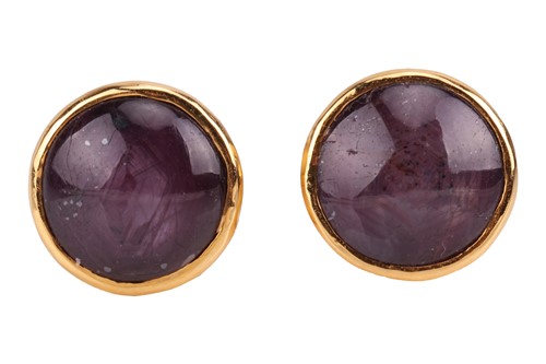 Lot A pair of purple star sapphire stud earrings,...