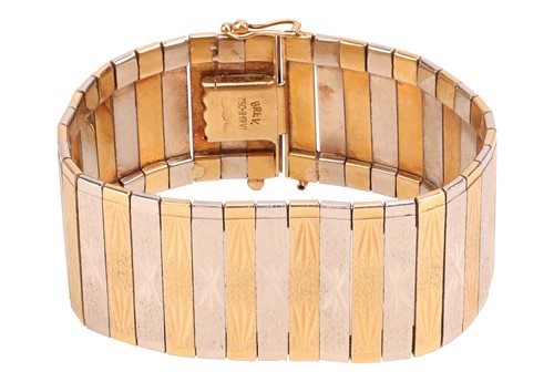 Lot 35 - A two-tone omega chain bracelet with a pair of...