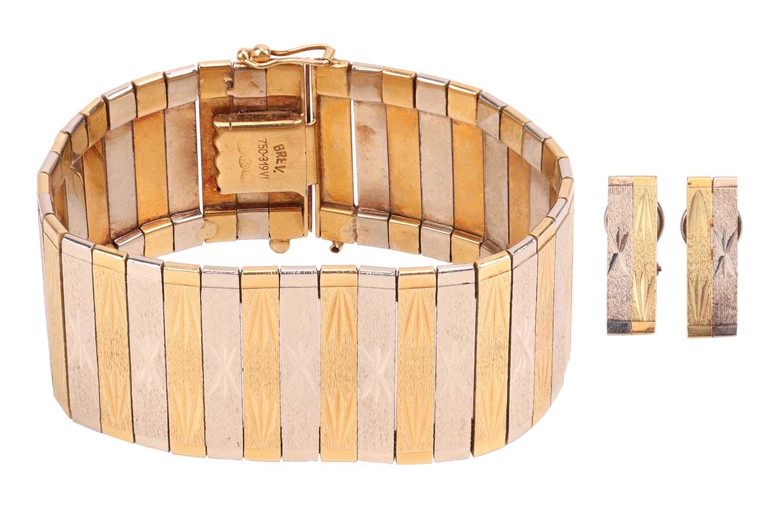 Lot 35 - A two-tone omega chain bracelet with a pair of...