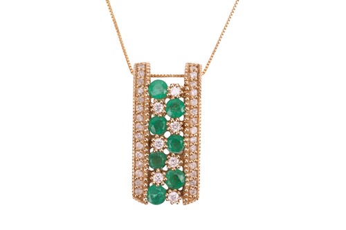 Lot 32 - An emerald and diamond pendant on chain, the...