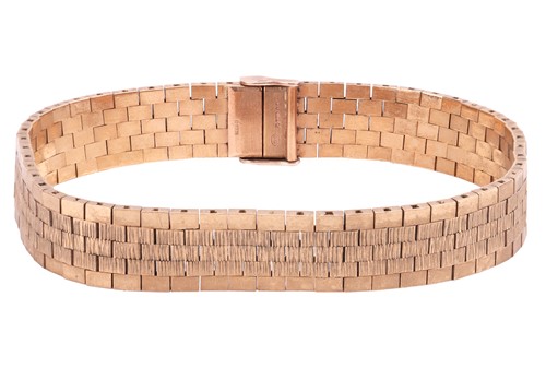 Lot 117 - A brick link bracelet in 9ct yellow gold,...