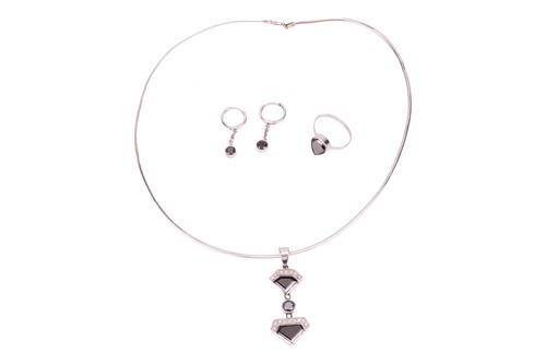 Lot 174 - A black diamond necklace, ring and earrings...