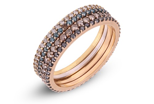 Lot 44 - A set of four diamond eternity "stacking"...